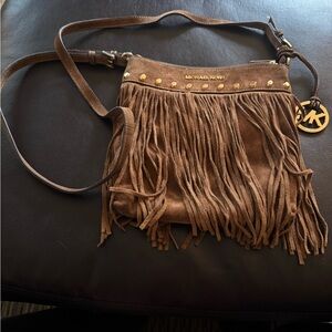 Michael Kors Crossbody - missing a few tassels and a few stains-price reflects